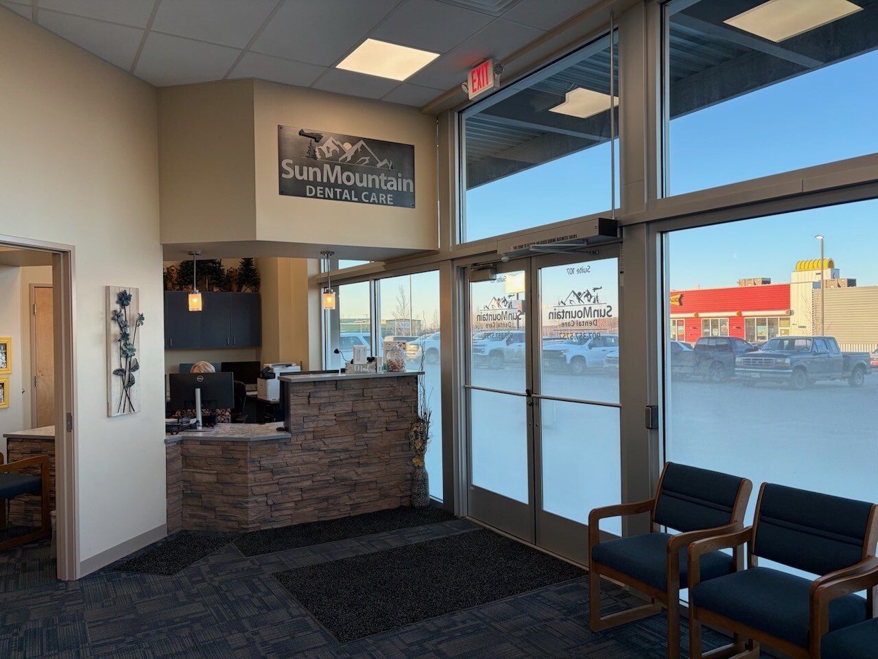 Dentist consulting with patient